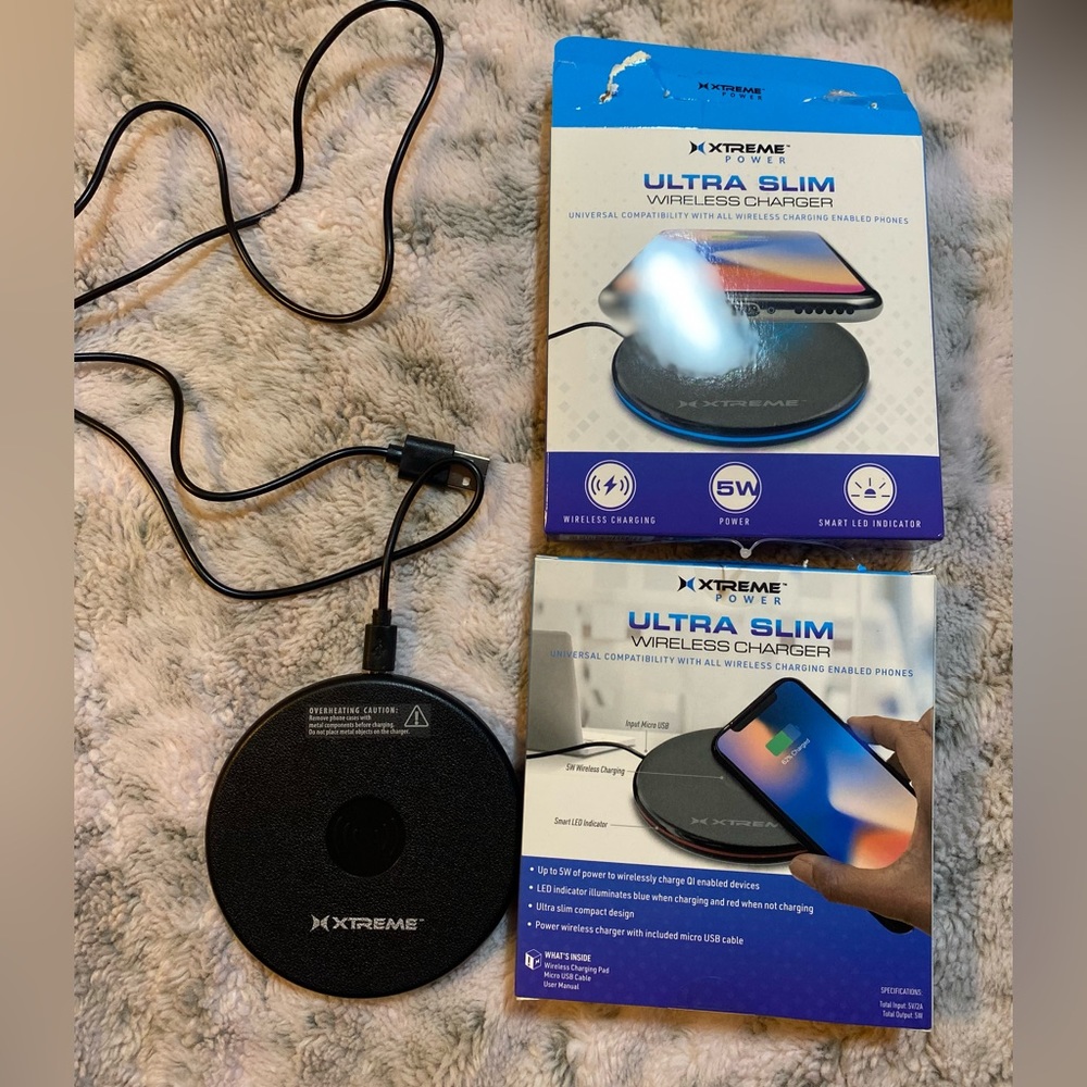 Two universal wireless chargers compatible with all wireless charging phones.
